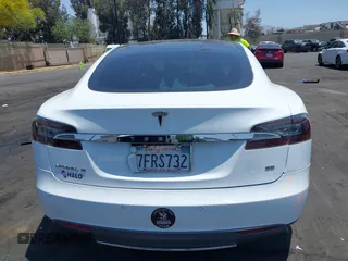 2014 Tesla Model S 60 с VIN 5YJSA1H17EFP40534, выставлен на аукционе IAAI как лот 42346697 с пробегом 203 166 миль миль и . История ставок и продаж доступна на DreamBid. Изображение 17.