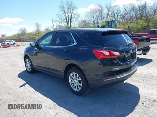2021 Chevrolet Equinox LT z VIN 2GNAXKEV8M6126322, wystawiony jako IAAI lot #41879017 z przebiegiem 116 489 mil mil oraz . Historia ofert i sprzedaży dostępna na DreamBid. Obrazek 3.