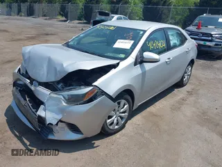 2016 Toyota Corolla L with VIN 5YFBURHE9GP414816, listed as a IAAI auction lot 42424221 with 87,270 mi miles and . Bid and sale history available at DreamBid. Image 2.