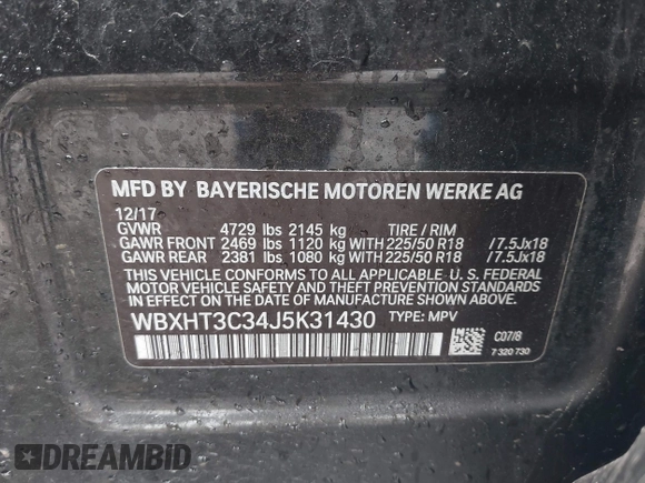 2018 BMW X1 xDrive28i with VIN WBXHT3C34J5K31430, listed as a IAAI auction lot 41954792 with 125,447 mi miles. Bid and sale history available at carsss.com. Image 9.