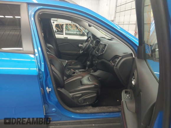 2020 Jeep Cherokee Trailhawk with VIN 1C4PJMBX6LD656570, listed as a IAAI auction lot 42399597 with 88,348 mi miles and . Bid and sale history available at DreamBid. Image 5.