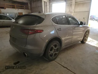 2018 Alfa Romeo Stelvio Ti z VIN ZASFAKBNXJ7B80163, wystawiony jako Copart lot #41805085 z przebiegiem Nie podano mil oraz Szkody całkowita. Historia ofert i sprzedaży dostępna na DreamBid. Obrazek 3.