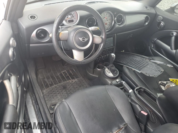 2005 MINI Convertible with VIN WMWRF334X5TG11889, listed as a Copart auction lot 55567995 with 169,717 mi miles and Salvage title. Bid and sale history available at DreamBid. Image 8.