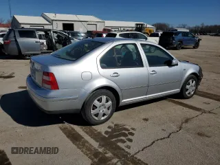 2004 Volkswagen Jetta GL с VIN 3VWRK69M84M103564, выставлен на аукционе Copart как лот 45903535 с пробегом 199 904 миль миль и Чистый • Clean title. История ставок и продаж доступна на DreamBid. Изображение 3.