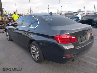 2015 BMW 5 Series 528i with VIN WBA5A5C55FD521110, listed as a IAAI auction lot 41614593 with 70,727 mi miles. Bid and sale history available at carsss.com. Image 3.