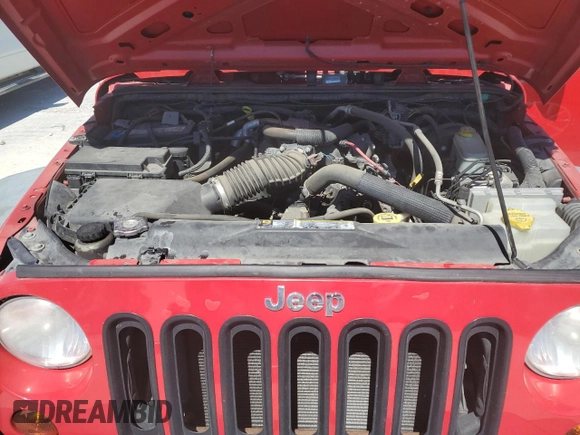 2011 Jeep Wrangler Sport with VIN 1J4AA2D19BL574527, listed as a Copart auction lot 49920225 with 121,730 mi miles and Clean Title. Bid and sale history available at carsss.com. Image 12.