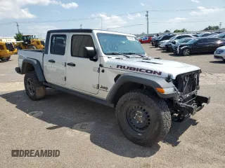 2022 Jeep Gladiator Rubicon z VIN 1C6JJTBG6NL104521, wystawiony jako Copart lot #57325365 z przebiegiem 31 498 mil mil oraz Szkoda całkowita • Salvage title. Historia ofert i sprzedaży dostępna na DreamBid. Obrazek 4.