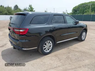 2015 Dodge Durango SXT with VIN 1C4RDJAG3FC161270, listed as a IAAI auction lot 42460444 with 112,633 mi miles and . Bid and sale history available at DreamBid. Image 4.