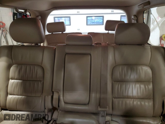 2002 Lexus LX 470 z VIN JTJHT00W023515545, wystawiony jako Copart lot #79218054 z przebiegiem 310 334 mil mil oraz Szkoda całkowita • Salvage title. Historia ofert i sprzedaży dostępna na DreamBid. Obrazek 10.