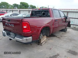 2025 Ram 1500 Big Horn with VIN 1C6RREFG5SN597979, listed as a IAAI auction lot 41931498 with 24,567 mi miles and . Bid and sale history available at DreamBid. Image 4.