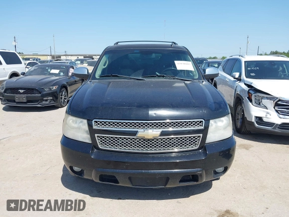 2011 Chevrolet Suburban LT with VIN 1GNSCJE09BR235355, listed as a IAAI auction lot 42030105 with 308,576 mi miles. Bid and sale history available at carsss.com. Image 6.