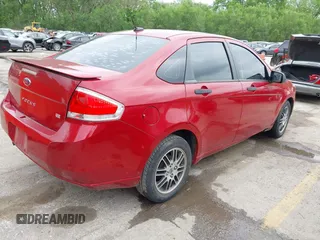 2010 Ford Focus SE with VIN 1FAHP3FN5AW160169, listed as a IAAI auction lot 42136904 with 146,605 mi miles. Bid and sale history available at carsss.com. Image 4.