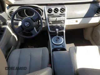 2008 Mazda CX-7 Grand Touring z VIN JM3ER29LX80190946, wystawiony jako Copart lot #61860475 z przebiegiem 136 545 mil mil oraz Czysty tytuł • Clean title. Historia ofert i sprzedaży dostępna na DreamBid. Obrazek 9.