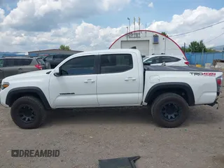 2022 Toyota Tacoma SR with VIN 3TMCZ5AN1NM478457, listed as a IAAI auction lot 42479107 with 59,547 mi miles and . Bid and sale history available at DreamBid. Image 15.