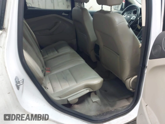 2014 Ford Escape SE with VIN 1FMCU9G99EUC15477, listed as a IAAI auction lot 42147162 with 98,886 mi miles and . Bid and sale history available at DreamBid. Image 8.