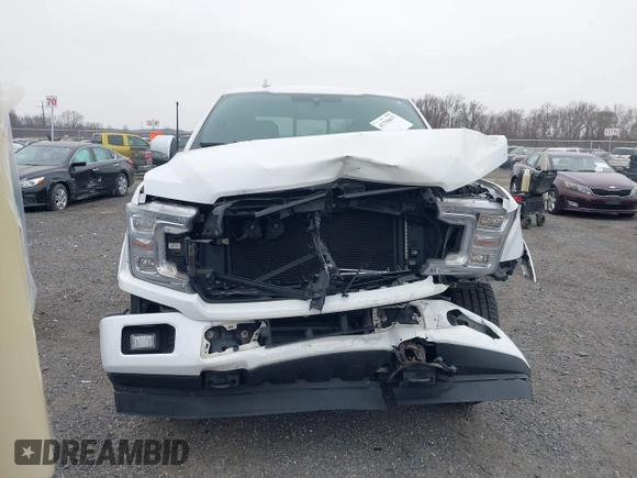 2018 Ford F-150 XL with VIN 1FTFW1EG6JFC17281, listed as a IAAI auction lot 41796817 with 106,105 mi miles. Bid and sale history available at carsss.com. Image 12.