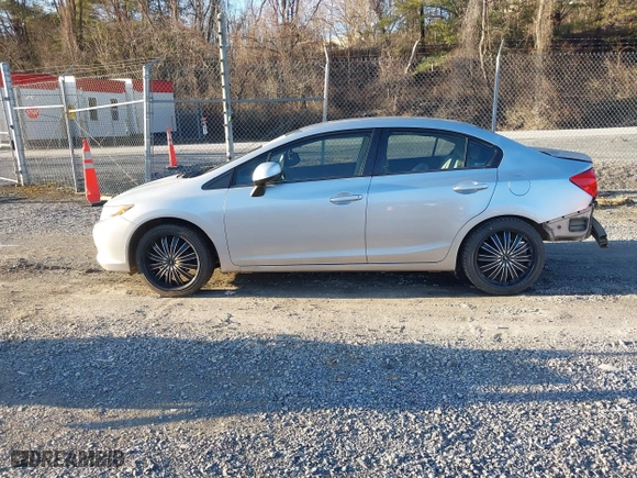 2012 Honda Civic Sdn LX with VIN 2HGFB2F57CH319433, listed as a IAAI auction lot 41536201 with 135,514 mi miles. Bid and sale history available at carsss.com. Image 14.