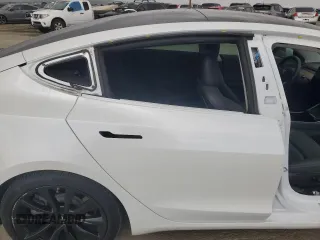 2019 Tesla Model 3 Mid Range with VIN 5YJ3E1EA8KF412886, listed as a Copart auction lot 50824565 with 54,803 mi miles and Salvage Title. Bid and sale history available at carsss.com. Image 10.