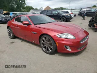 2013 Jaguar XK with VIN SAJWA4FB2DLB50515, listed as a Copart auction lot 66511554 with 147,876 mi miles and Salvage Title. Bid and sale history available at carsss.com. Image 4.
