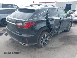 2017 Lexus RX 350 with VIN 2T2BZMCA3HC090218, listed as a IAAI auction lot 42148051 with 94,954 mi miles and . Bid and sale history available at DreamBid. Image 4.