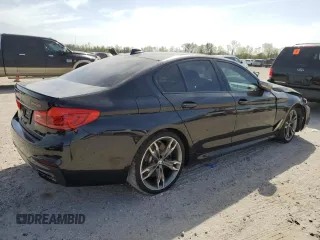 2020 BMW 5 Series M550i xDrive z VIN WBAJS7C01LCD23365, wystawiony jako Copart lot #49166705 z przebiegiem 42 293 mil mil oraz Szkoda całkowita • Salvage title. Historia ofert i sprzedaży dostępna na DreamBid. Obrazek 3.
