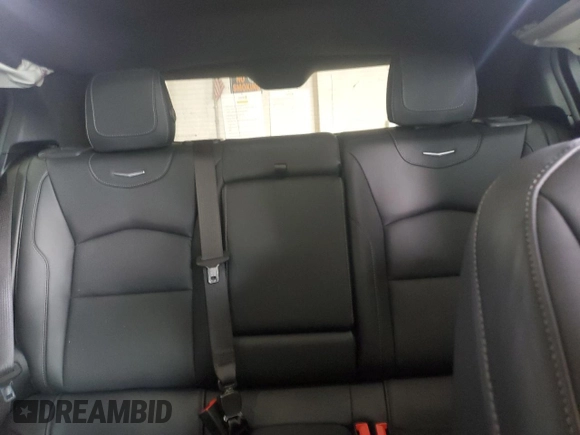 2023 Cadillac XT4 AWD Premium Luxury z VIN 1GYFZDR43PF174188, wystawiony jako Copart lot #59106355 z przebiegiem 27 530 mil mil oraz Szkoda całkowita • Salvage title. Historia ofert i sprzedaży dostępna na DreamBid. Obrazek 10.