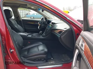 2015 Cadillac CTS Luxury AWD z VIN 1G6AX5SX5F0129130, wystawiony jako IAAI lot #42147471 z przebiegiem 93 678 mil mil oraz . Historia ofert i sprzedaży dostępna na DreamBid. Obrazek 5.