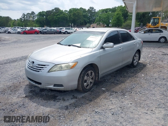 2007 Toyota Camry CE with VIN 4T1BE46KX7U074048, listed as a IAAI auction lot 42101519 with 214,034 mi miles and . Bid and sale history available at DreamBid. Image 2.