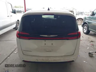 2023 Chrysler Pacifica Touring L with VIN 2C4RC1BG6PR550575, listed as a IAAI auction lot 42576498 with 54,373 mi miles and . Bid and sale history available at DreamBid. Image 16.