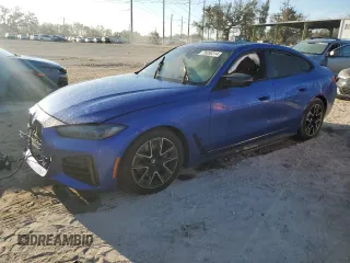 2022 BMW 4 Series M440i xDrive z VIN WBA13AW00NFL94612, wystawiony jako Copart lot #76690314 z przebiegiem Nie podano mil oraz Szkoda całkowita • Salvage title. Historia ofert i sprzedaży dostępna na DreamBid. Obrazek 1.