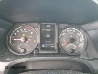 2023 Toyota Tacoma SR z VIN 3TYRX5GN4PT080447, wystawiony jako Copart lot #66465664 z przebiegiem 13 388 mil mil oraz Nie do naprawy • Non repairable. Historia ofert i sprzedaży dostępna na DreamBid. Obrazek 9.