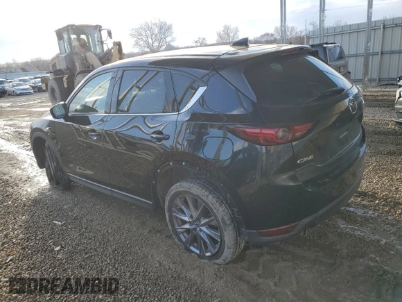 2019 Mazda CX-5 Grand Touring with VIN JM3KFADM2K1560309, listed as a Copart auction lot 46361345 with 160,863 mi miles and Salvage Title. Bid and sale history available at carsss.com. Image 2.