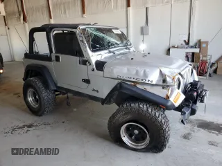 2006 Jeep Wrangler Rubicon with VIN 1J4FA69S26P734731, listed as a Copart auction lot 52009295 with 117,872 mi miles and Salvage title. Bid and sale history available at DreamBid. Image 4.