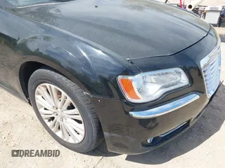2013 Chrysler 300 with VIN 2C3CCAKG2DH645193, listed as a IAAI auction lot 42105459 with 230,063 mi miles. Bid and sale history available at carsss.com. Image 6.