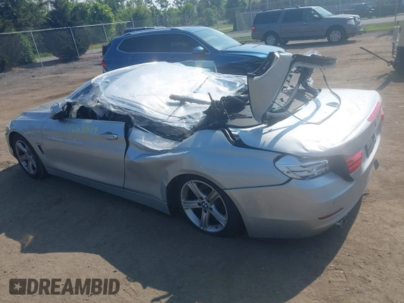 2014 BMW 4 Series 428i with VIN WBA3V7C55EJ873028, listed as a IAAI auction lot 42432699 with 24,063 mi miles and . Bid and sale history available at DreamBid. Image 3.
