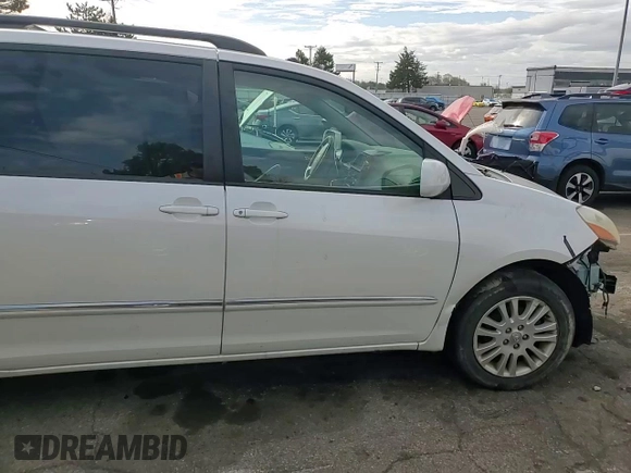 2010 Toyota Sienna XLE z VIN 5TDDK4CC8AS033402, wystawiony jako Copart lot #79083354 z przebiegiem 226 956 mil mil oraz Szkoda całkowita • Salvage title. Historia ofert i sprzedaży dostępna na DreamBid. Obrazek 11.