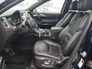 2017 Mazda CX-9 Grand Touring z VIN JM3TCADY3H0140573, wystawiony jako Copart lot #60513145 z przebiegiem 97 793 mil mil oraz Czysty tytuł • Clean title. Historia ofert i sprzedaży dostępna na DreamBid. Obrazek 7.