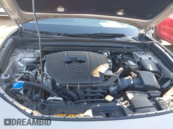 2024 Mazda CX-30 S Premium with VIN 3MVDMBDM9RM628162, listed as a IAAI auction lot 41262359 with 30,392 mi miles and . Bid and sale history available at DreamBid. Image 10.
