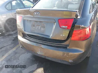 2011 Kia Forte EX with VIN KNAFU4A25B5358977, listed as a IAAI auction lot 40992404 with 137,478 mi miles. Bid and sale history available at carsss.com. Image 12.