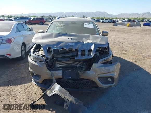 2019 Jeep Cherokee Latitude with VIN 1C4PJLCB2KD474165, listed as a IAAI auction lot 42100594 with 91,363 mi miles and . Bid and sale history available at DreamBid. Image 12.