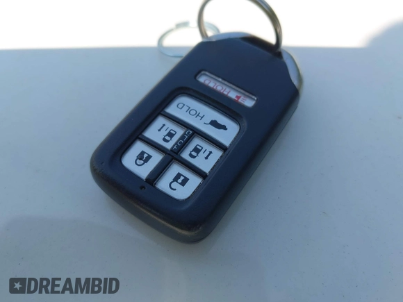 2014 Honda Odyssey EX-L with VIN 5FNRL5H63EB131596, listed as a IAAI auction lot 42402427 with 106,156 mi miles and . Bid and sale history available at DreamBid. Image 11.