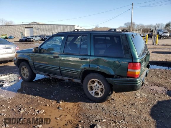 1997 Jeep Grand Cherokee Limited with VIN 1J4GZ78Y2VC728605, listed as a Copart auction lot 83342804 with 104,185 mi miles and Salvage Title. Bid and sale history available at carsss.com. Image 2.
