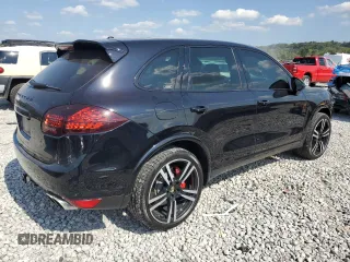 2014 Porsche Cayenne Turbo with VIN WP1AC2A2XELA85702, listed as a Copart auction lot 72328394 with 100,142 mi miles and Salvage title. Bid and sale history available at DreamBid. Image 3.
