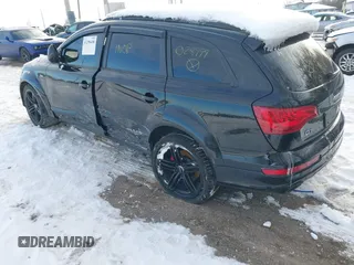 2015 Audi Q7 3.0T S line Prestige with VIN WA1DGAFE8FD028999, listed as a IAAI auction lot 41298408 with 111,446 mi miles. Bid and sale history available at carsss.com. Image 3.