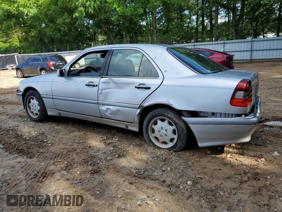 1999 Mercedes-Benz C 230/260/280/320 with VIN WDBHA24G4XA749633, listed as a Copart auction lot 56560105 with 221,306 mi miles and Salvage title. Bid and sale history available at DreamBid. Image 2.