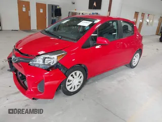 2015 Toyota Yaris L with VIN VNKKTUD30FA034347, listed as a IAAI auction lot 41968602 with 104,197 mi miles and . Bid and sale history available at DreamBid. Image 2.