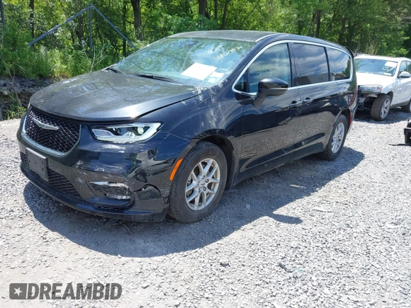 2023 Chrysler Pacifica Touring L with VIN 2C4RC1BG2PR534194, listed as a IAAI auction lot 42613934 with 69,896 mi miles and . Bid and sale history available at DreamBid. Image 18.
