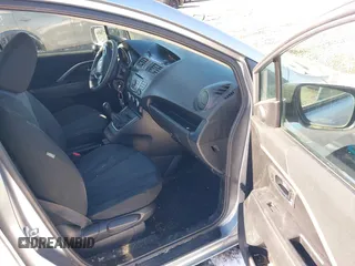 2014 Mazda 5 Sport with VIN JM1CW2BLXE0168119, listed as a IAAI auction lot 41527688 with 142,357 mi miles and . Bid and sale history available at DreamBid. Image 5.