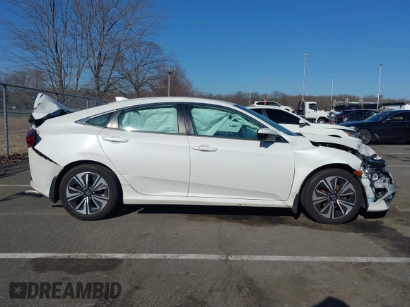 2017 Honda Civic Sedan EX-L with VIN 2HGFC1F70HH651956, listed as a IAAI auction lot 41754511 with 129,385 mi miles. Bid and sale history available at carsss.com. Image 13.
