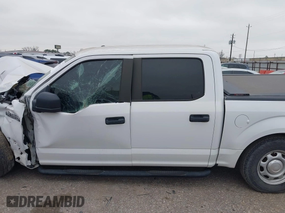 2019 Ford F-150 XL with VIN 1FTEW1C56KKF04321, listed as a IAAI auction lot 41597391 with 93,126 mi miles and . Bid and sale history available at DreamBid. Image 14.